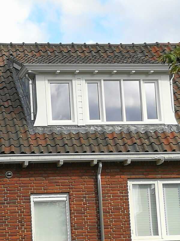 schuindak dakkapel met zink en hout afgewerkt